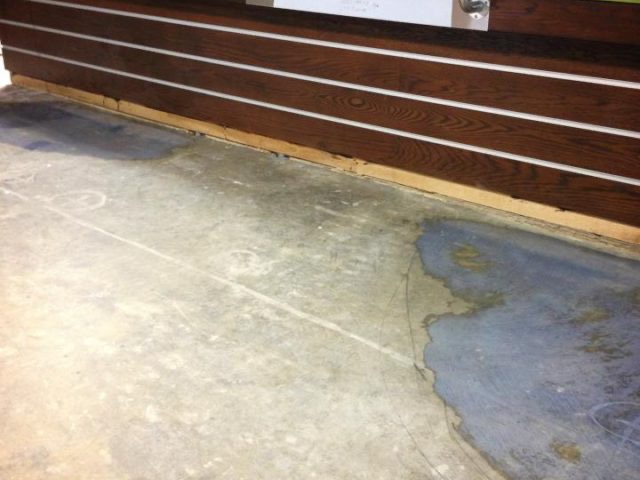 Exterior wood slat steps with stone landscaping